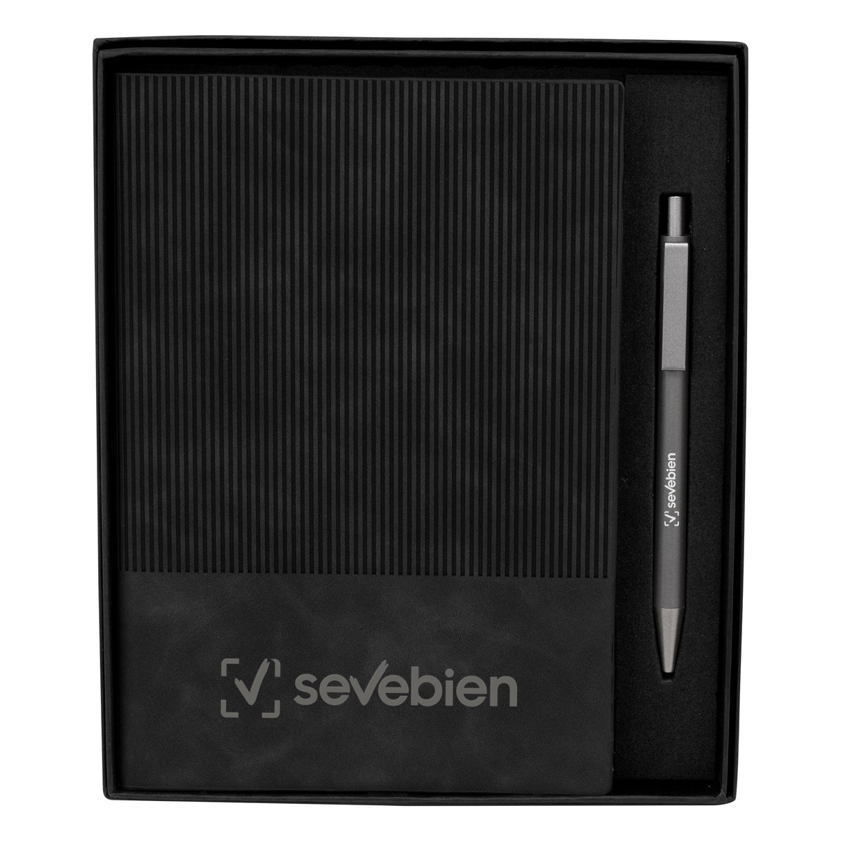 Set ejecutivo en caja negra con libreta de líneas y bolígrafo dentro.